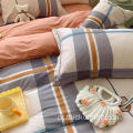 Frenha de cama de lençol acadêmico na cama de cama de cama